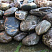 Kamenclub.ru: Валунчик Паутинник фр.100-300 мм  купить в Нижнем Тагиле крупный природный камень галечник темно-серый с прожилками белый черный речной валунчик 5000 руб/т   фото КАМЕНЬ КЛУБ